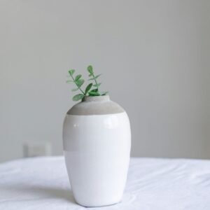 Sculptural white ceramic vase demo product for HomeGlo