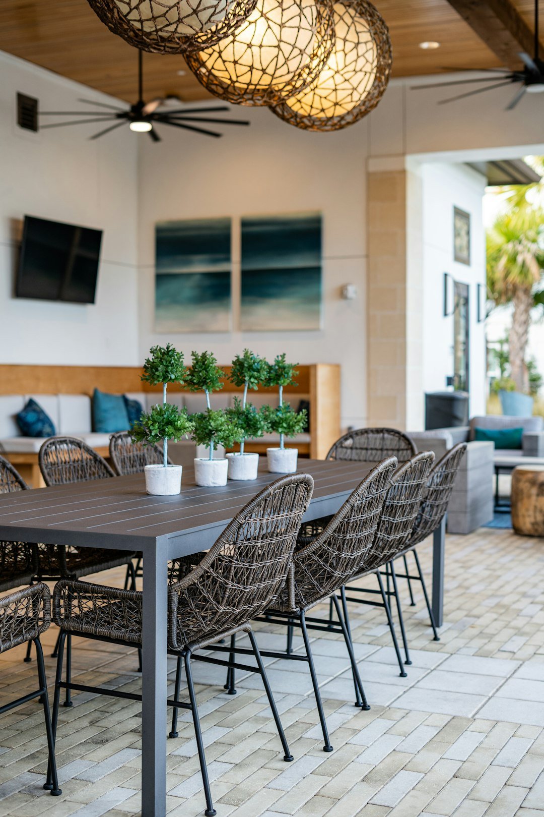 Modern outdoor patio with neutral furniture and decor