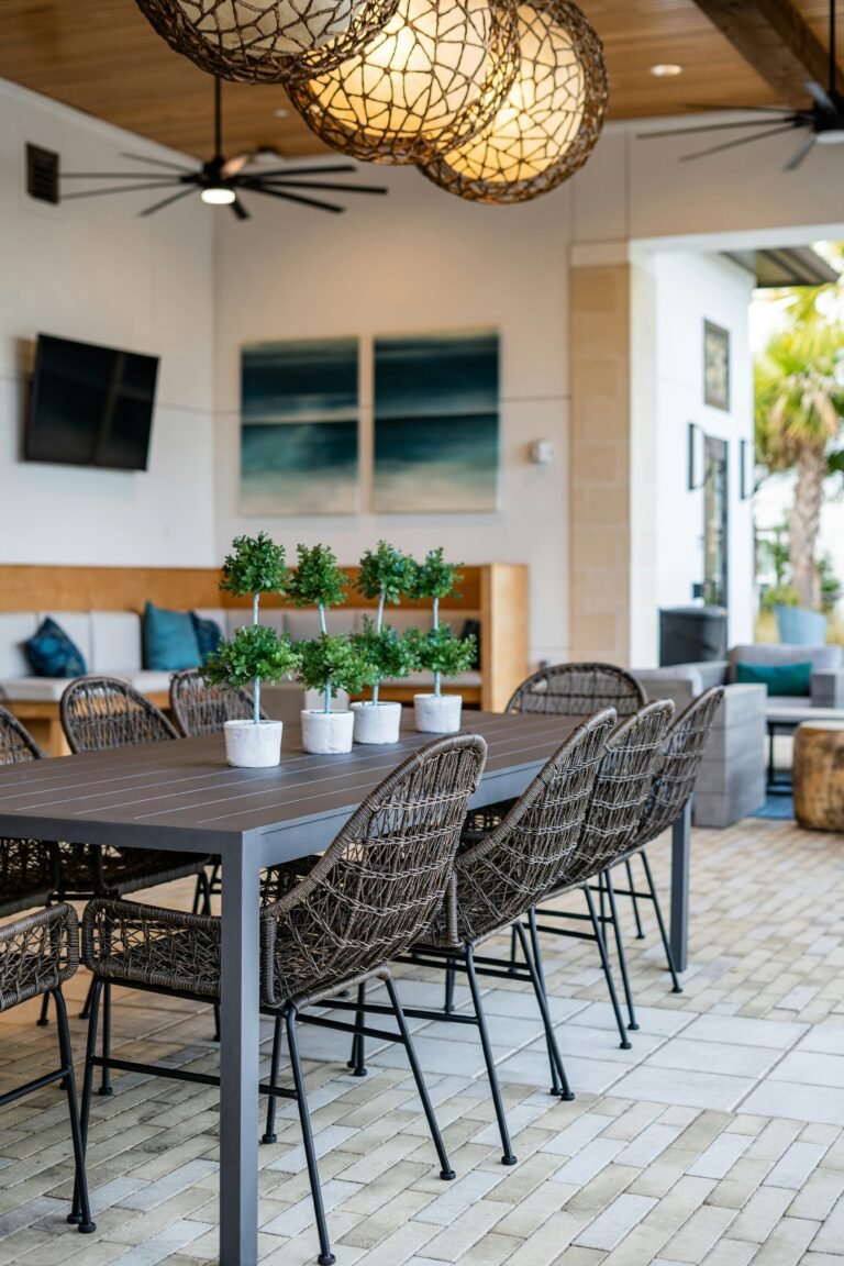 Modern outdoor patio with black table and chairs